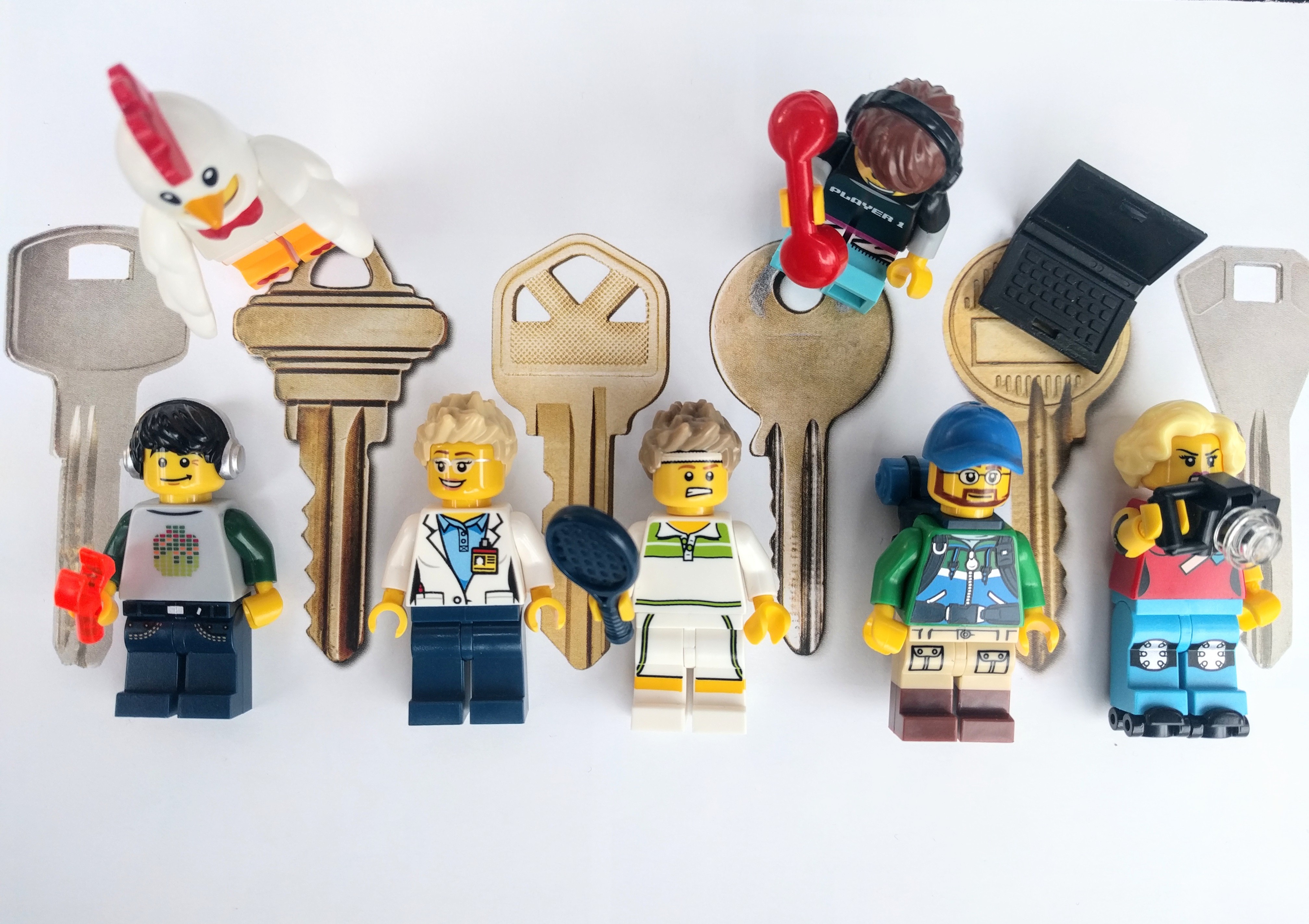 lego figures lying down with keys