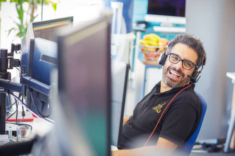 Things we like: Raoul smiling, sitting at his desk